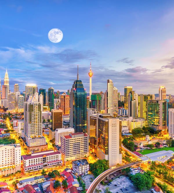 Downtown Kuala Lumpur skyline at twilight in Malaysia